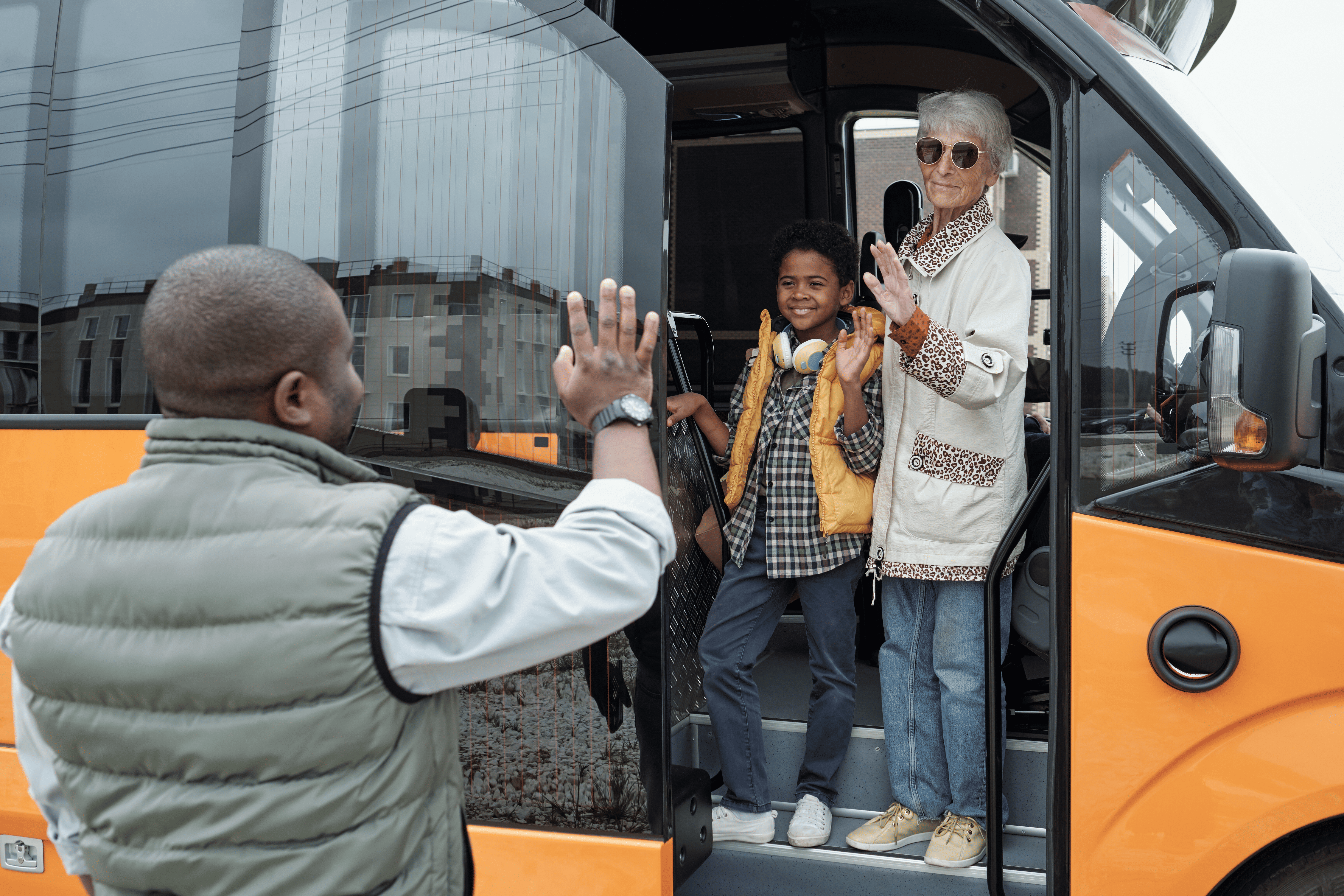 Students boarding a DBS cleared minibus near Brussels Airport